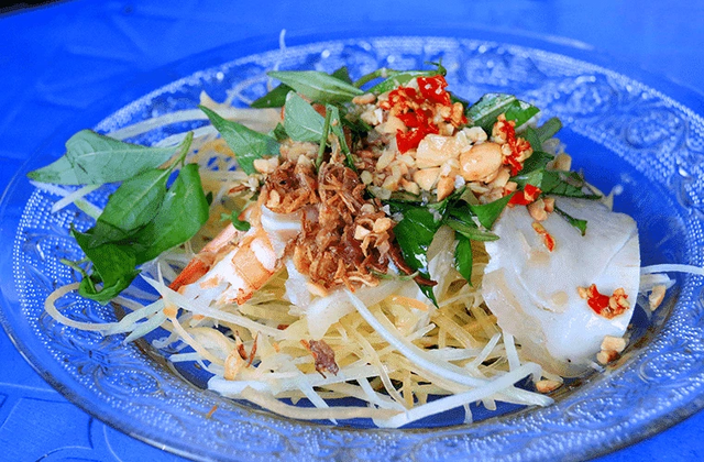 Traditional Vietnamese street food dishes featured on Ho Chi Minh City walking food tour for culinary enthusiasts