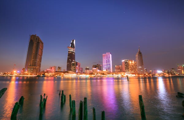 Panoramic evening skyline and riverside of Ho Chi Minh City captured during sunset photography tour