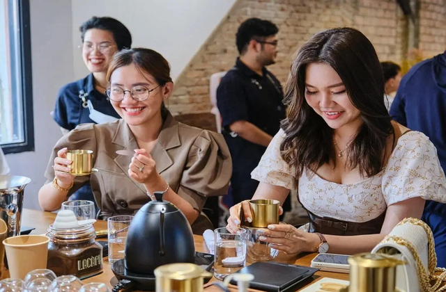 Visitors enjoying coffee brewing and tasting session at Lacaph Coffee in Ho Chi Minh City with small-batch roasting experience