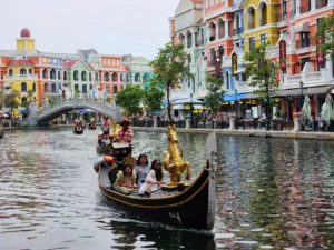  Tourists on a Venice-style gondola ride in in Grand World theme park in Phu Quoc Island, a popular holiday destination in Vietnam 