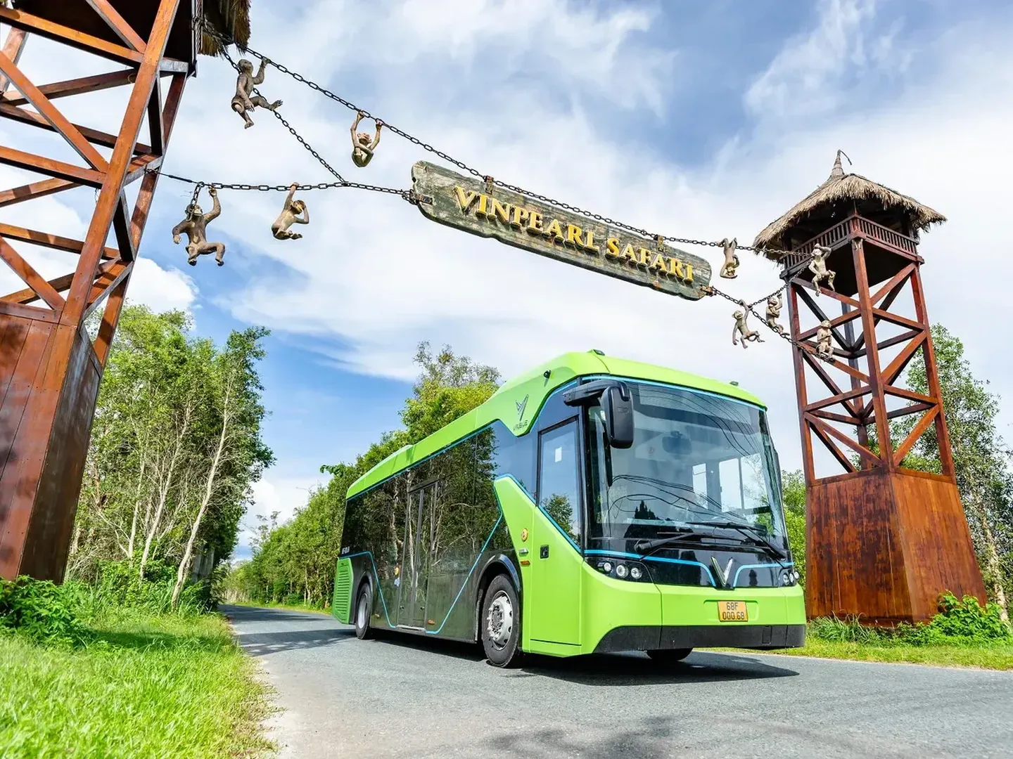  A tourist bus with visitors is passing through the gates of Safari Phu Quoc theme park-a popular tourist destination in Vietnam 